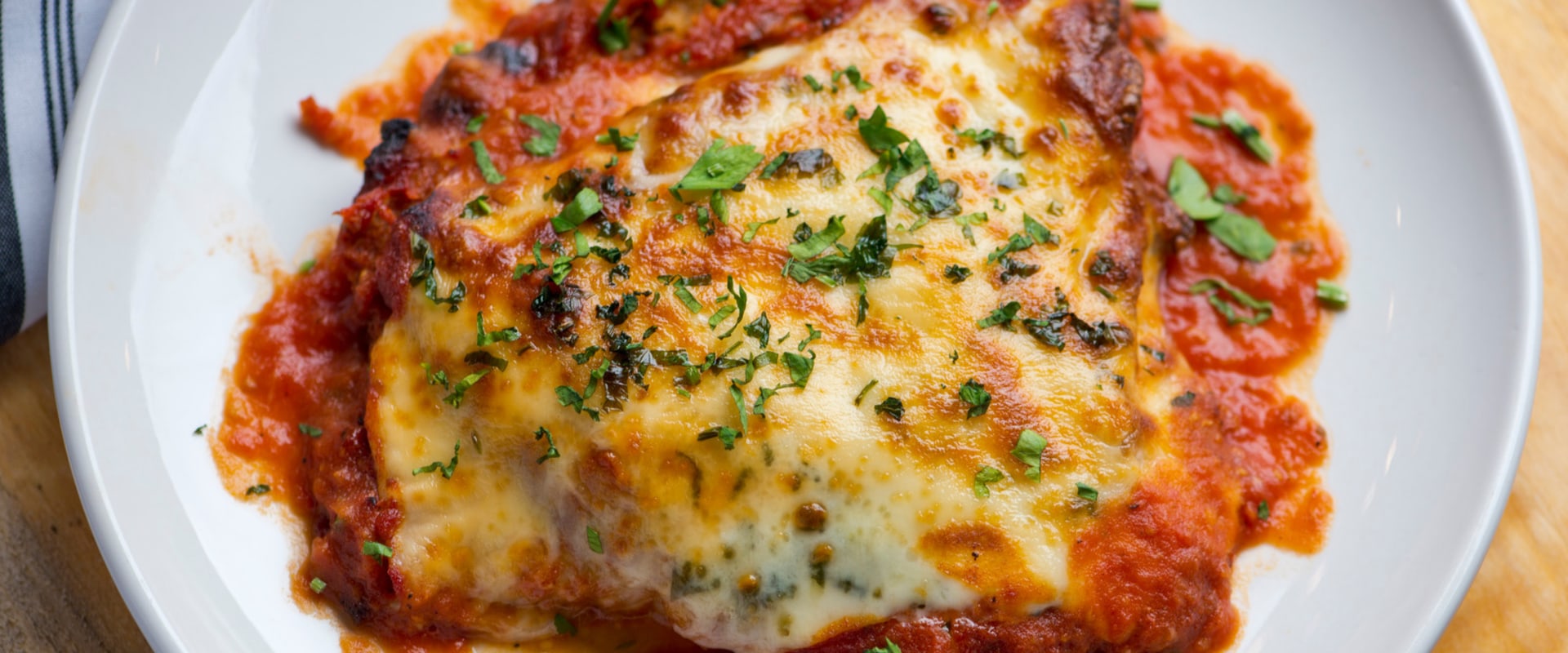 Why is chicken parm called that?